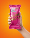 Metallic Snack Package in a Hand Mockup