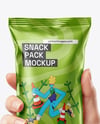 Metallic Snack Package in a Hand Mockup