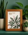 Wooden Framed Poster on Shelf with Plants Mockup
