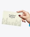 Postcard in a Hand Mockup