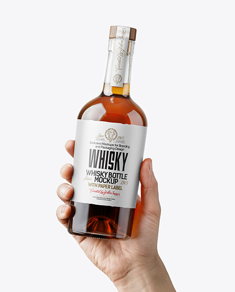 Whisky Bottle in a Hand Mockup