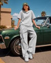 Woman in an Oversized T-Shirt and Cargo Pants Mockup
