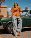 Woman in an Oversized T-Shirt and Cargo Pants Mockup