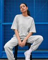 Woman in an Oversized T-Shirt and Sweatpants Mockup