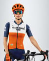 Woman Wearing Full Cycling Kit with Road Bike Mockup