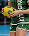Woman Wearing Full Handball Kit with Ball Mockup