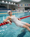 Woman Wearing Swimming Legsuit in Pool Mockup