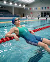 Woman Wearing Swimming Legsuit in Pool Mockup