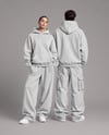 Young Couple Wearing Oversized Hoodie Mockup