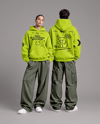 Young Couple Wearing Oversized Hoodie Mockup