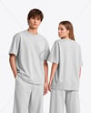 Young Couple Wearing Oversized T-Shirts Mockup