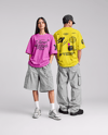 Young Couple Wearing Oversized T-Shirts Mockup