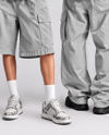 Young Couple Wearing Oversized T-Shirts Mockup