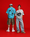 Young Couple Wearing Oversized T-Shirts Mockup