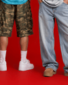 Young Couple Wearing Oversized T-Shirts Mockup