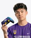 Young Asian Man with Game Controller Wearing eSports Jersey Mockup