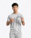 Young Asian Man with Game Controller Wearing eSports Jersey Mockup