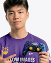 Young Asian Man with Game Controller Wearing eSports Jersey Mockup