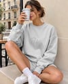 Young Woman Wearing an Oversized Sweatshirt Mockup