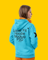 Young Woman Wearing Hoodie with Headphones Mockup