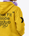 Young Woman Wearing Hoodie with Headphones Mockup