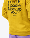 Young Woman Wearing Hoodie with Headphones Mockup