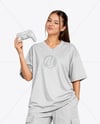 Young Woman with Game Controller Wearing eSports Jersey Mockup