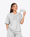 Young Woman with Game Controller Wearing eSports Jersey Mockup