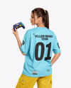 Young Woman with Game Controller Wearing eSports Jersey Mockup