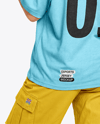 Young Woman with Game Controller Wearing eSports Jersey Mockup